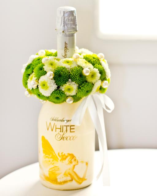 Sparkling Wine with flower arrangement